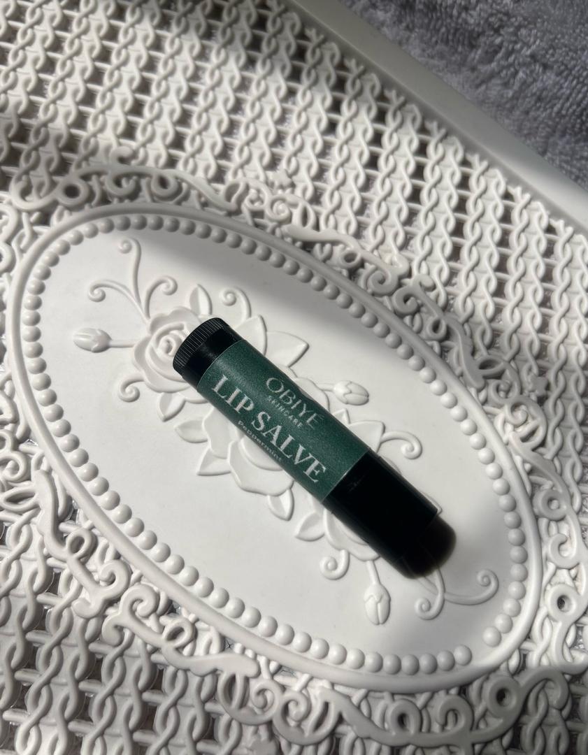 ÓBÍYÉ Lip Salve held in hand